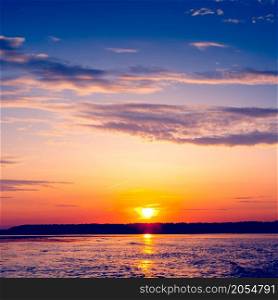 Amazing sunset over the lake. Europe, Ukraine. Amazing sunset