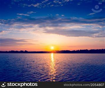 Amazing sunset over the lake. Europe, Ukraine. Amazing sunset