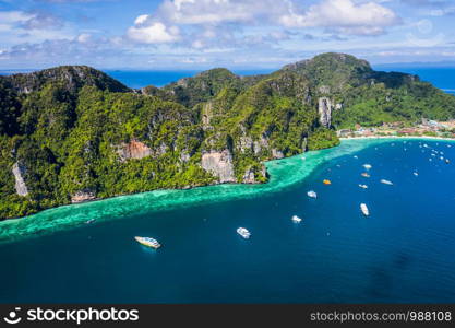 amazing Thailand hi season boats and tourists international on phi-phi island Krabi Thailand aerial view from drone camera