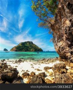 Amazing tropical landscape with Koh Tub island. Blue sky and turquoise ocean with limestone formation. Thailand, Krabi province, Ao Nang