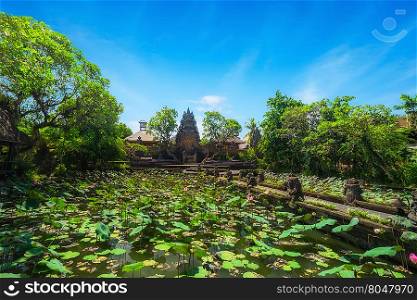 Amazing view of pond with lotus flowers near Pura Saraswati Hindu temple in Ubud, Bali, Indonesia