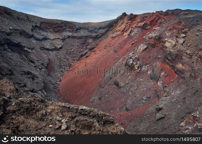 Amazing volcanic landscape. Volcano crater in Timanfaya national park, Lanzarote, canary islands, Spain.
