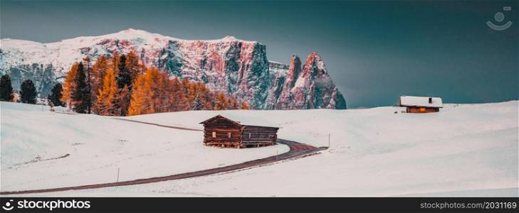 amazing winter landscape at sunrise in Alpe di Siusi. Dolomites Italy - winter holidays destination