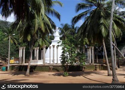 Ambasthala dagaba and palm trees in Mihintale, Sri Lanka