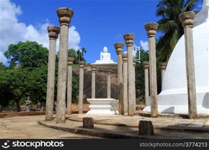 Ambasthala stupa and white Buddha in Mihintale, Sri Lanka