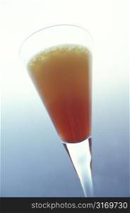 Amber Colored Drink in a Stemmed Glass