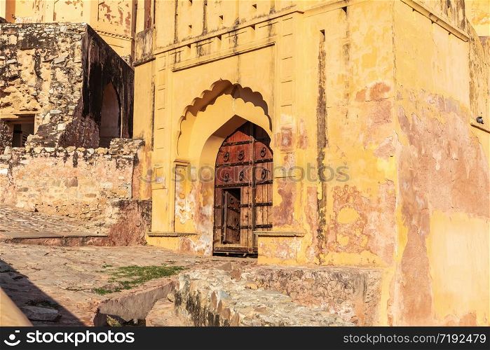 Amber Fort, old entrance in the wall in Jaipur, Rajasthan, India. Amber Fort, old entrance in the wall, Jaipur, Rajasthan, India