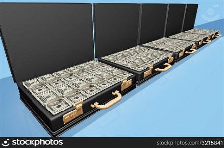American dollar bills in briefcases