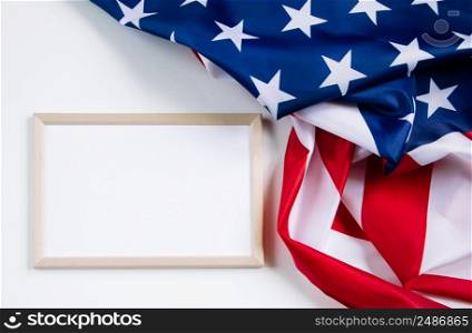 American flag and empty frame for text on white background. Culture of the USA. Concept for independence, memorial day or labor day.. American flag and empty frame for text on white background. Culture of USA. Concept for independence, memorial day or labor day.