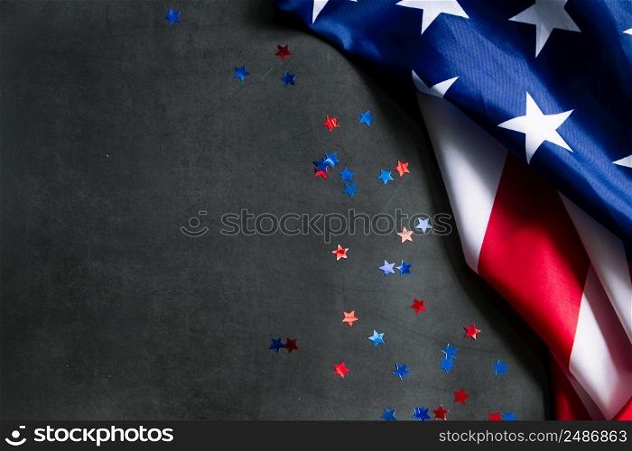American flag and stars on a dark background. USA national holidays concept. Independence Day, Memorial Day, Labor Day. Place for your text.. American flag and stars on a dark background. USA national holidays concept. Independence Day, Memorial Day, Labor Day.