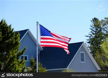 American flag at suburban neighborhood