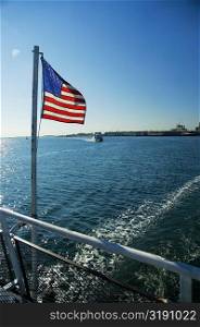 American Flag fixed with the railing, Boston, Massachusetts, USA