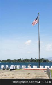 American flag fluttering at the seaside, Pearl Harbor, Honolulu, Oahu, Hawaii Islands, USA