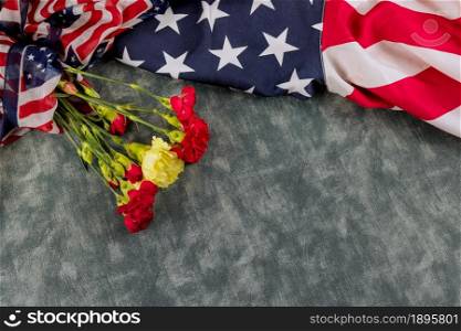 American flag for Memorial Day in the Remembrance Veterans Day pink carnation flowers. American flag for Memorial Day in Remembrance Veterans Day pink carnation flowers
