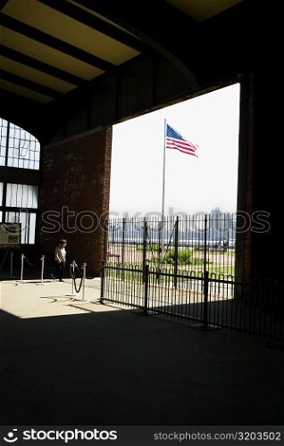 American flag in front of a building, New York City, New York State, USA
