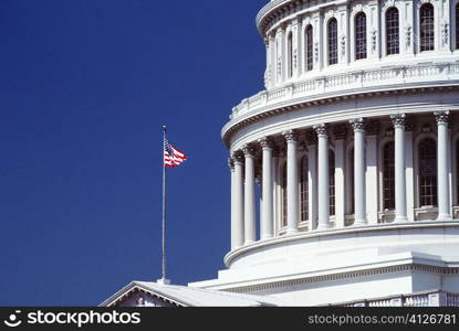 American flag in front of a government building, Capitol Building, Washington DC, USA
