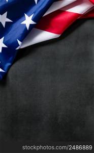 American flag on a dark concrete background. USA national holidays concept. Independence Day, Memorial Day, Labor Day. Place for your text.. American flag on dark concrete background. USA national holidays concept. Independence Day, Memorial Day, Labor Day.