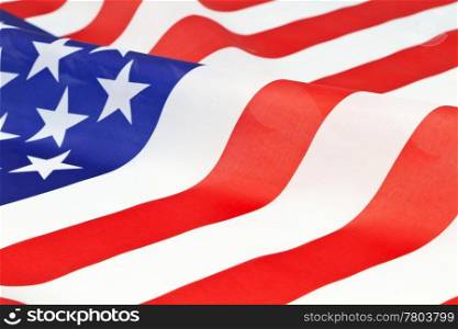 American flag ripples in close up, studio shot;