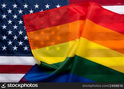 American flag together with gay pride rainbow lgbt flag. Equality diversity in USA concept.