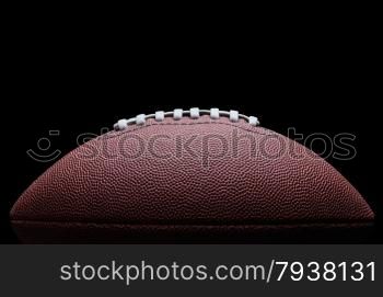 American football over black background