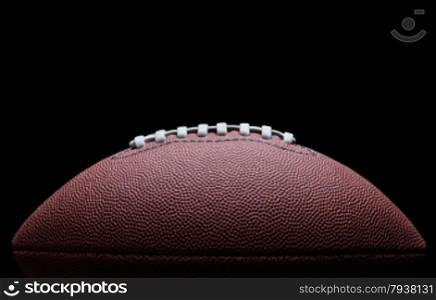 American football over black background