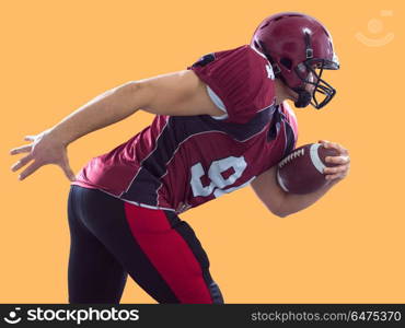American football Player running with the ball isolated on a colorful background. American football Player running with the ball