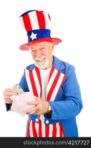 American icon Uncle Sam saving money in his piggy bank. Isolated.