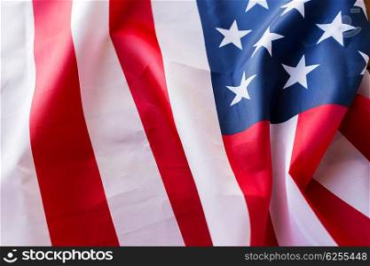 american independence day, patriotism and nationalism concept - close up of american flag