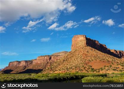 American landscapes- prairie and cliffs, Utah, USA.