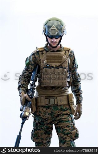 american  marine corps special operations modern warfare soldier with fire arm weapon and protective army tactical gear ready for battle