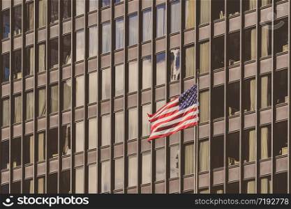 American national flags over the Chicago building cityscape, independence day or july 4 concept