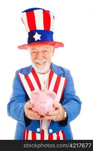 American Uncle Sam holding a piggy bank with a twenty dollar bil sticking out of it. Isolated on white.