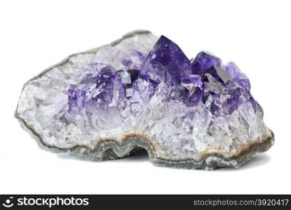 Amethyst geodes segment from Uruguay on a white background