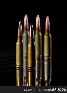 Ammunition cartridges on black background. Ammunition cartridges