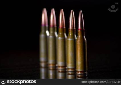 Ammunition cartridges on black background. Ammunition cartridges
