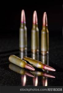 Ammunition cartridges on black background. Ammunition cartridges