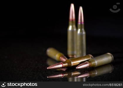 Ammunition cartridges on black background. Ammunition cartridges on black