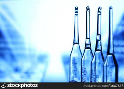 ampoule on abstract bokeh background
