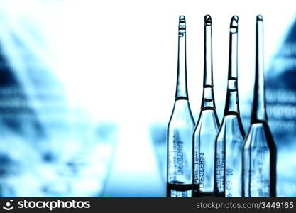 ampoule on abstract bokeh background