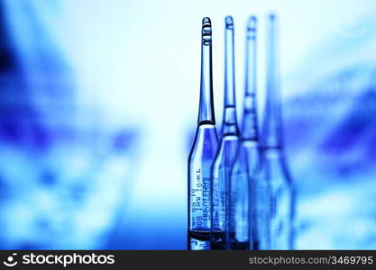 ampoule on abstract bokeh background