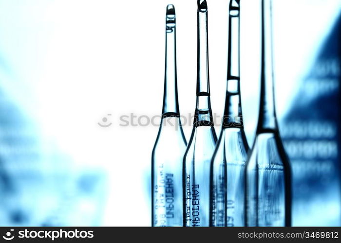 ampoule on abstract bokeh background