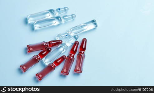 Ampoules with medical preparations or vaccine for injection on the table