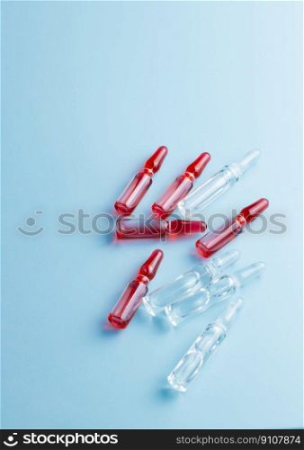 Ampoules with medical preparations or vaccine for injection on the table