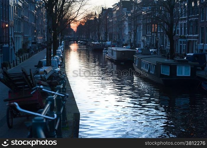 Amsterdam canal at a beautiful evening light. Netherlands