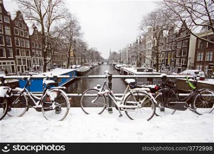 Amsterdam covered with snow in winter in the Netherlands