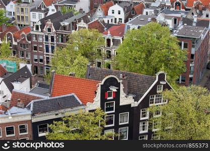 Amsterdam from above, apartment buildings, historic houses in the old city district, Holland, Netherlands.