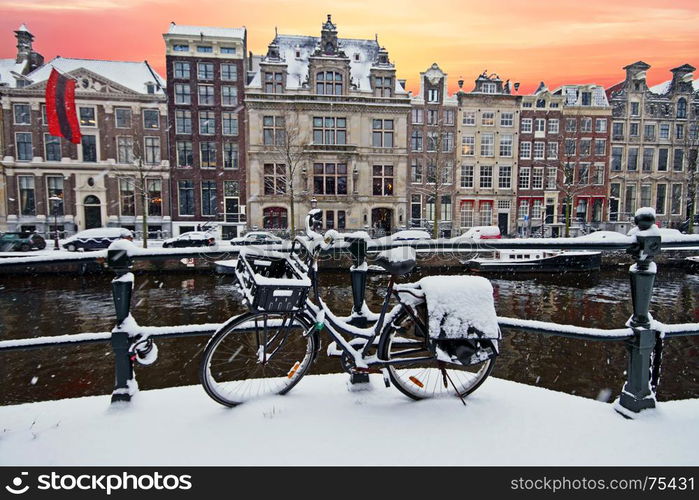 Amsterdam in winter in the Netherlands at sunset