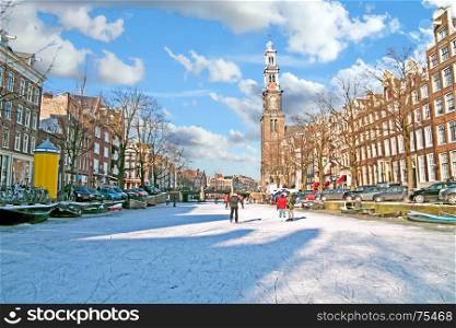 Amsterdam in winter with the Westerkerk in the Netherlands