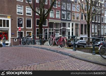 AMSTERDAM, NETHERLANDS - MARCH 27, 2018  beautiful view of the streets and canals of Amsterdam 
