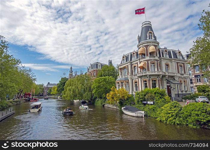 Amsterdam, Netherlands - May 16, 2019: Dutch house with the Amsterdam flag honoring the national championship from Ajax in Amsterdam the Netherlands